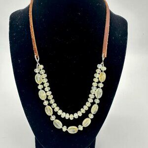 Green gemstone and leather necklace